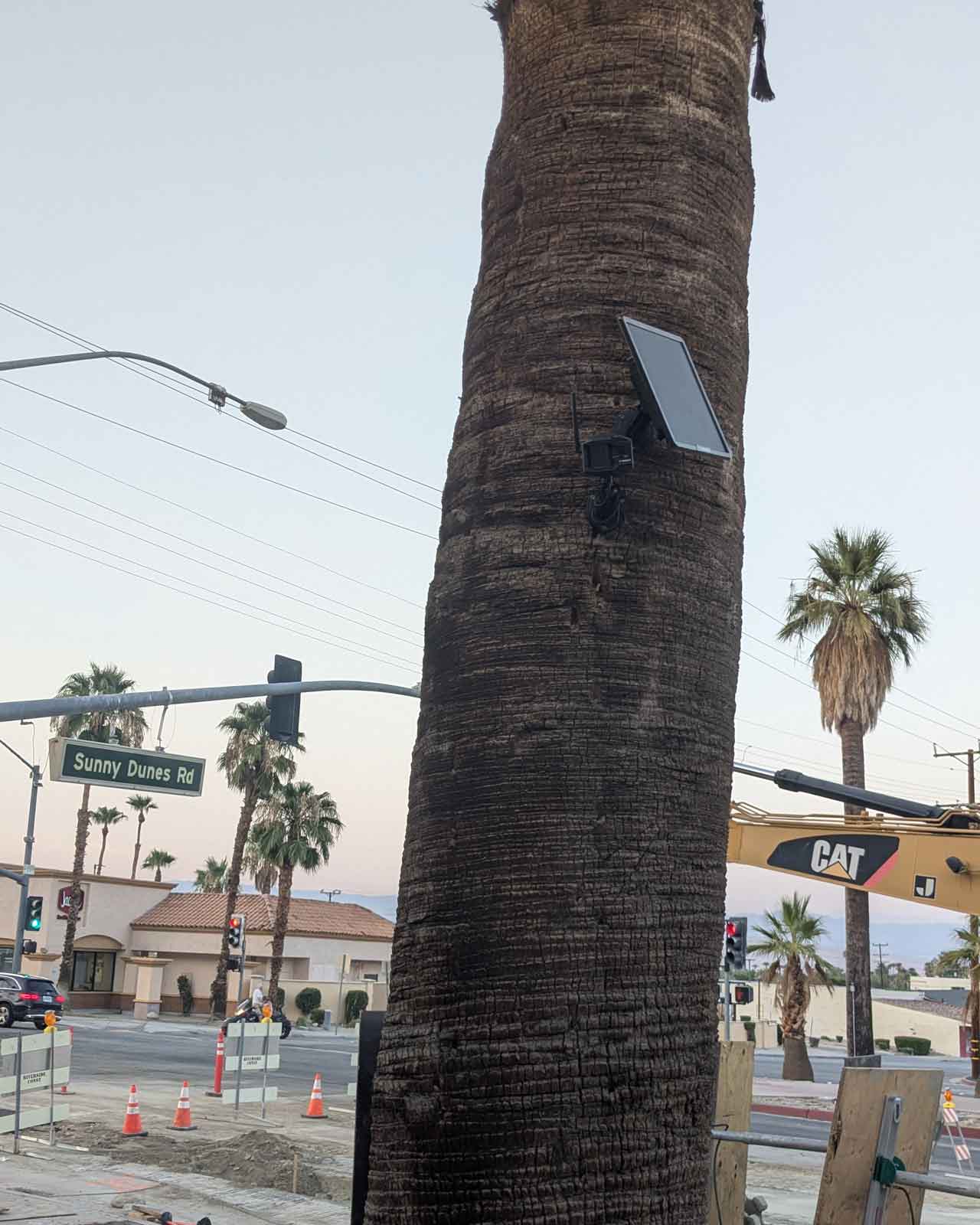 Solar-powered security camera installed on a street in Palm Springs, CA